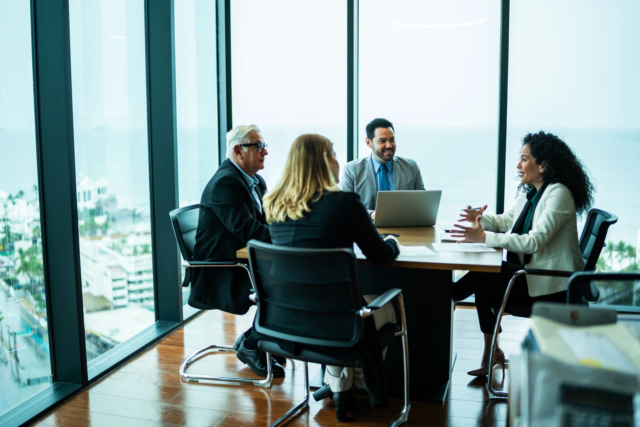 Attorneys in discussion during an office meeting